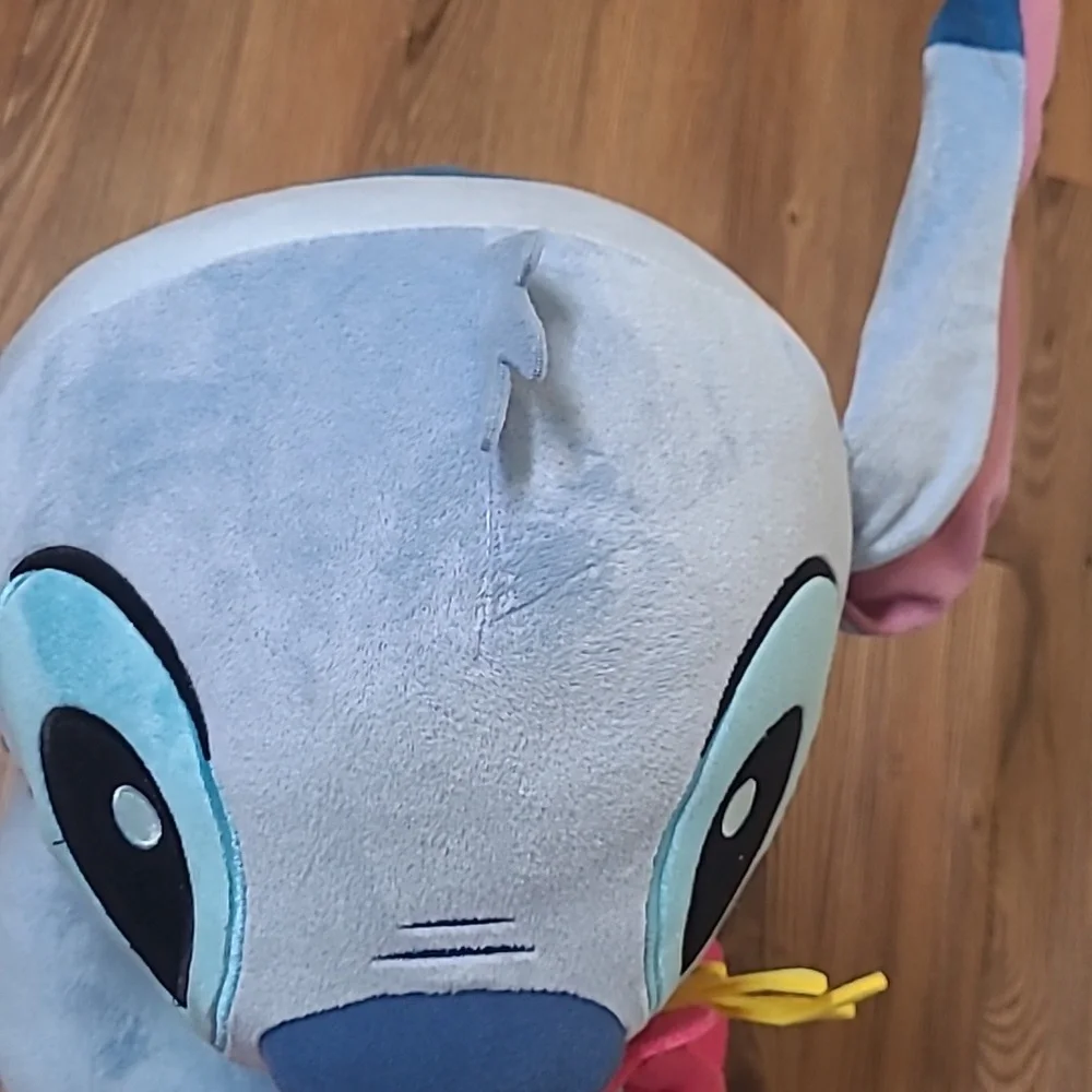 Disney Blue and‎ Pink Stitch Plush with Green Doll used good condition.